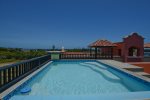 The roof top pool, always peaceful with great views of the sea and mountains behind West Bay